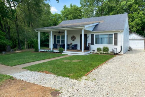 Quaint Creekside Cottage with Porch and Backyard!